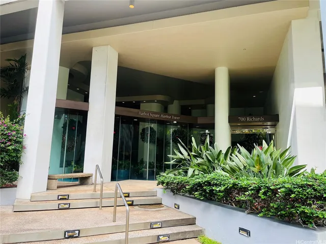 a potted plant sitting in front of a building