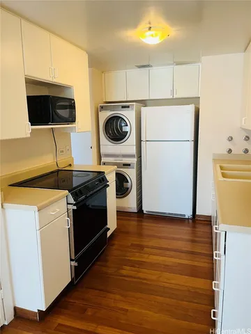 a kitchen with a stove and a microwave