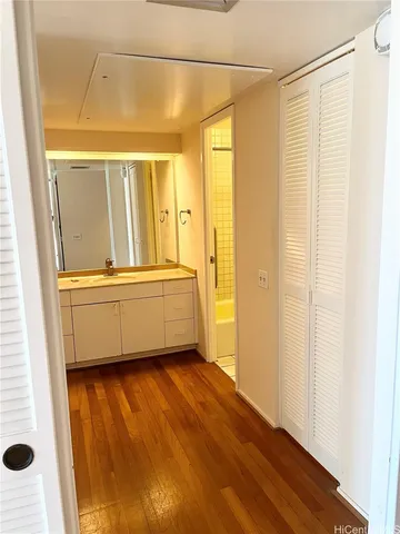 a bathroom with a tub and a shower