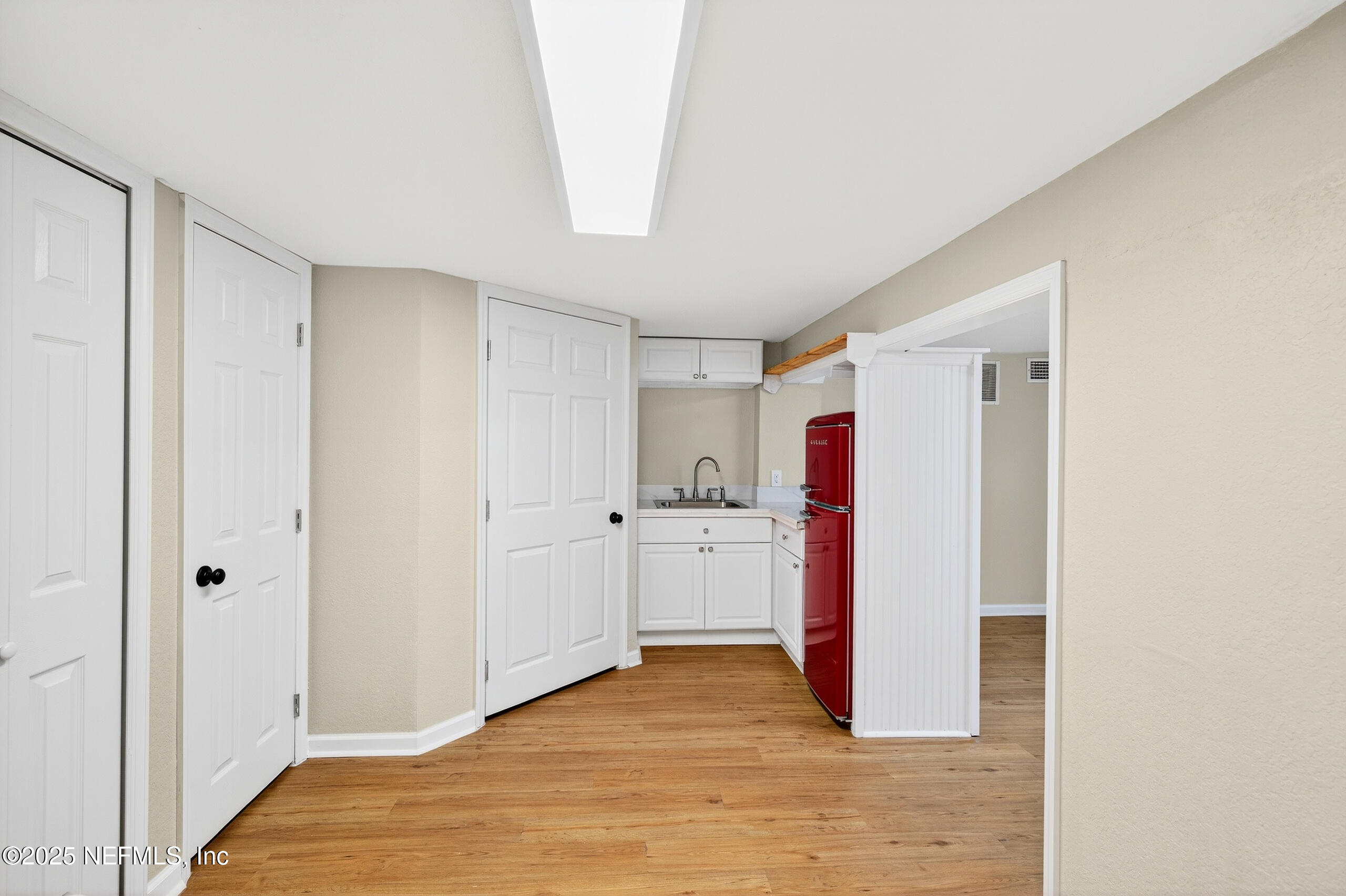 9906 Jeanette Road Jacksonville, FL 32246 - Photo 25 of 32 a view of walk in closet with lots of storage and utility