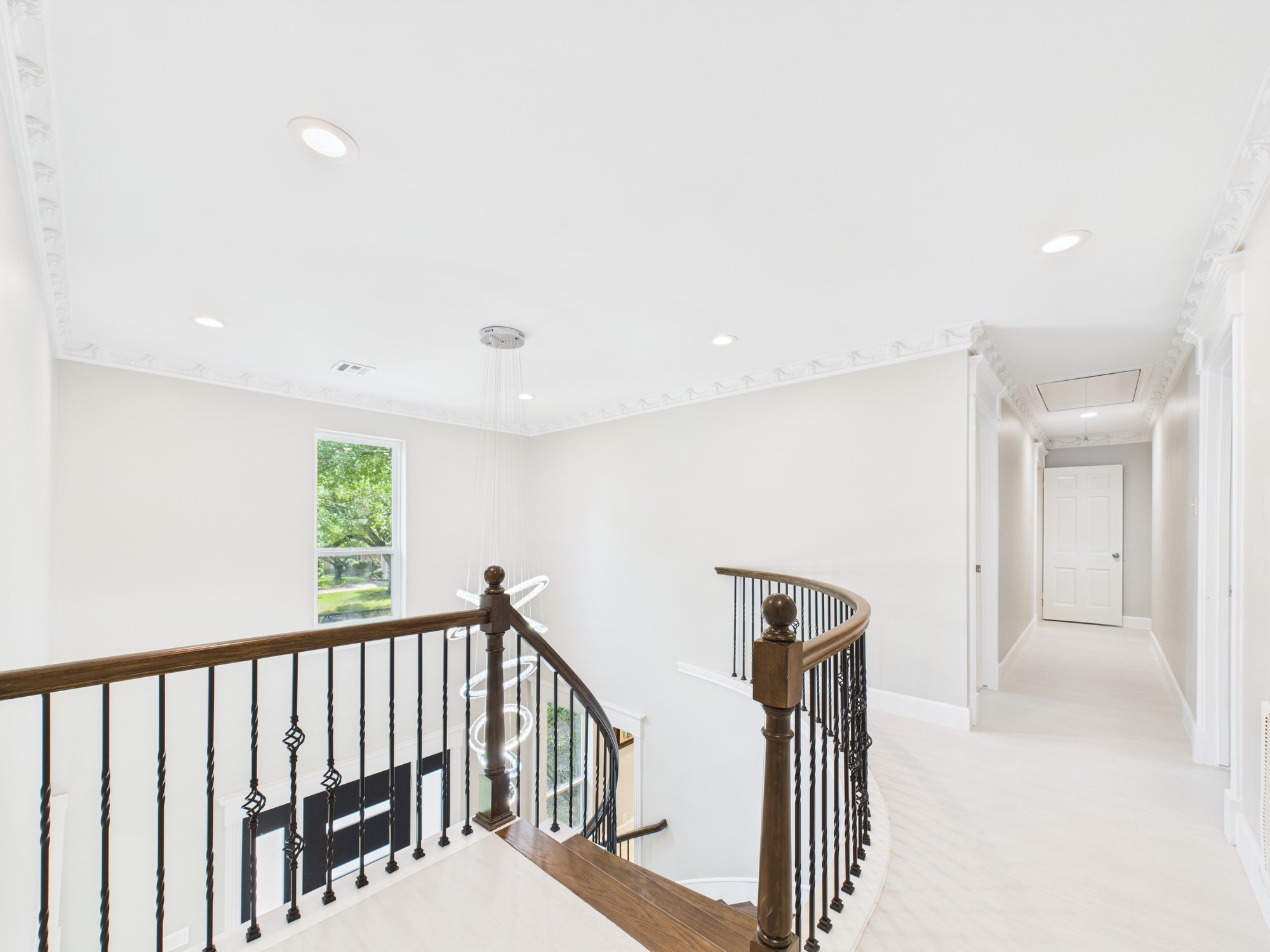 702 Daria Court Houston, TX 77079 - Photo 24 of 44 View from the Second Floor Landing; Beautifuly Detailed Crown Molding