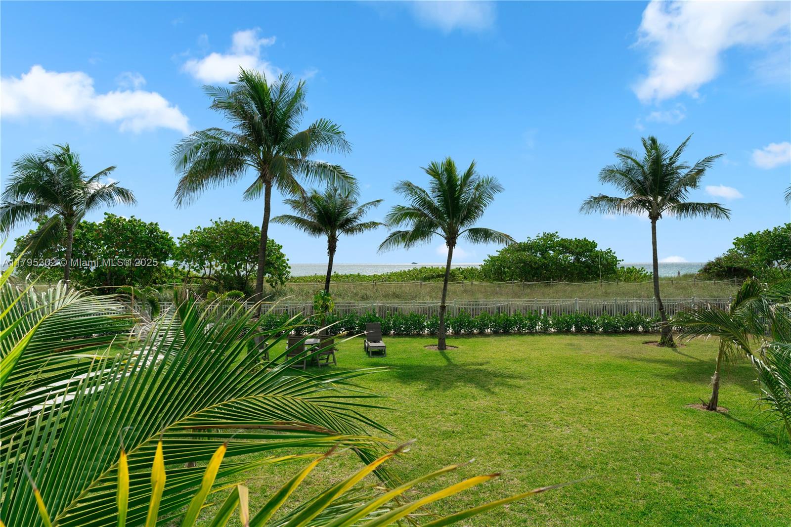 9511 Collins Avenue, Unit 301 Surfside, FL 33154 - Photo 15 of 15 a view of a garden with a palm tree