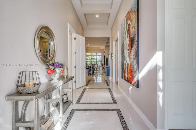 a view of a dining room with furniture and window