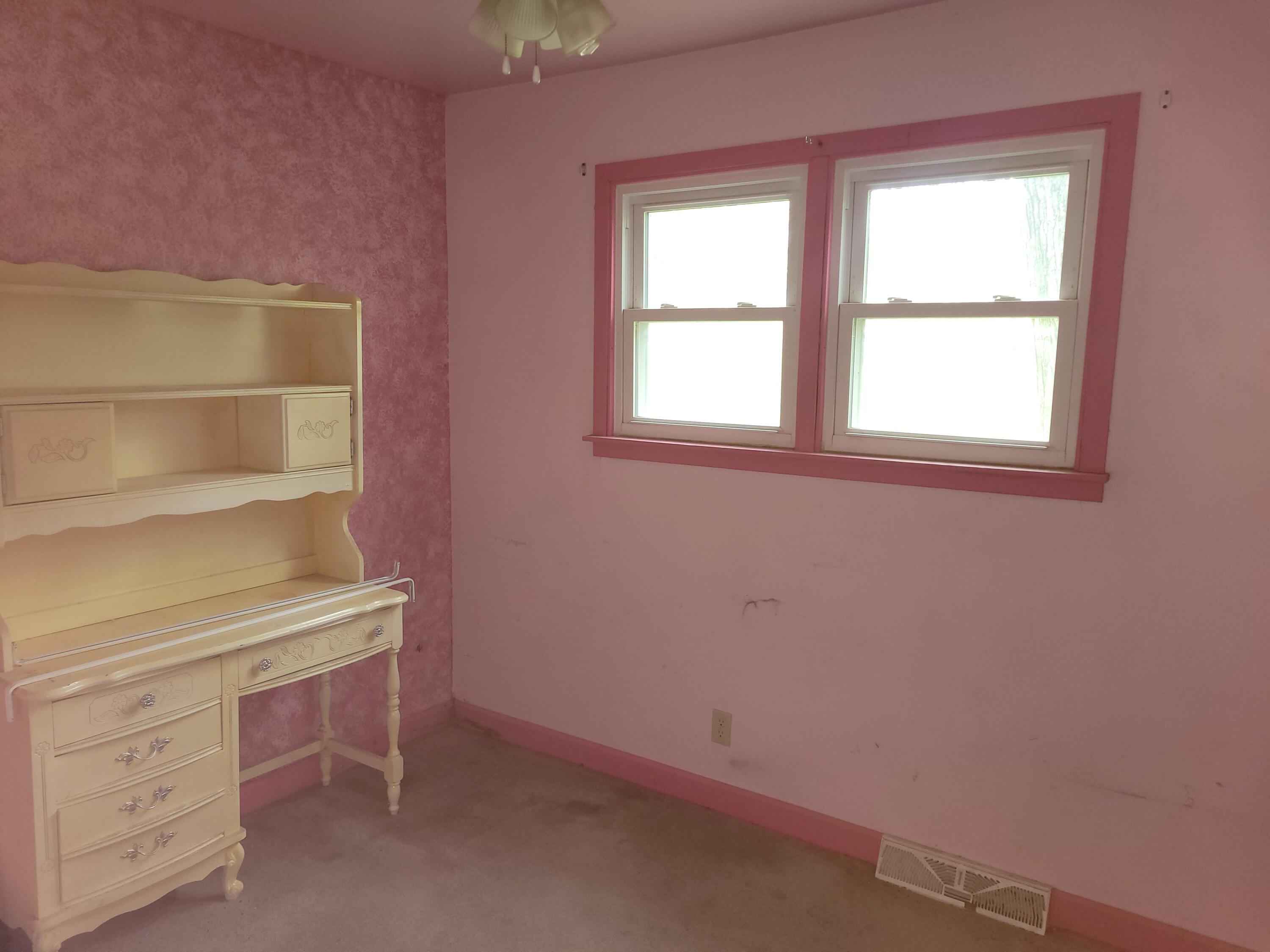 63 Deerpath Road Merrillville, IN 46410 - Photo 7 of 14 an empty room with a window