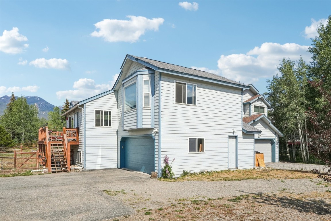 380 Riley Road Silverthorne, CO 80498 - Photo 12 of 49 a view of a house with a yard