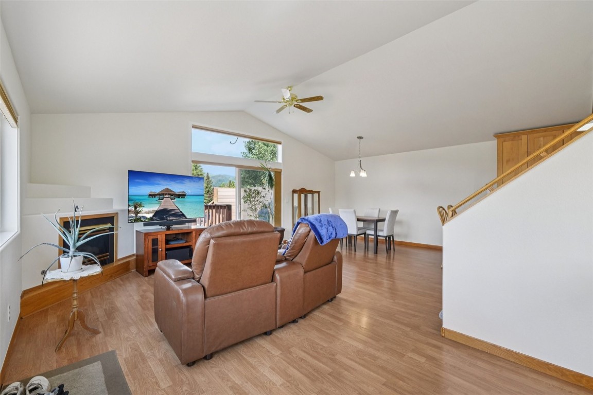 380 Riley Road Silverthorne, CO 80498 - Photo 19 of 49 a living room with furniture and a wooden floor