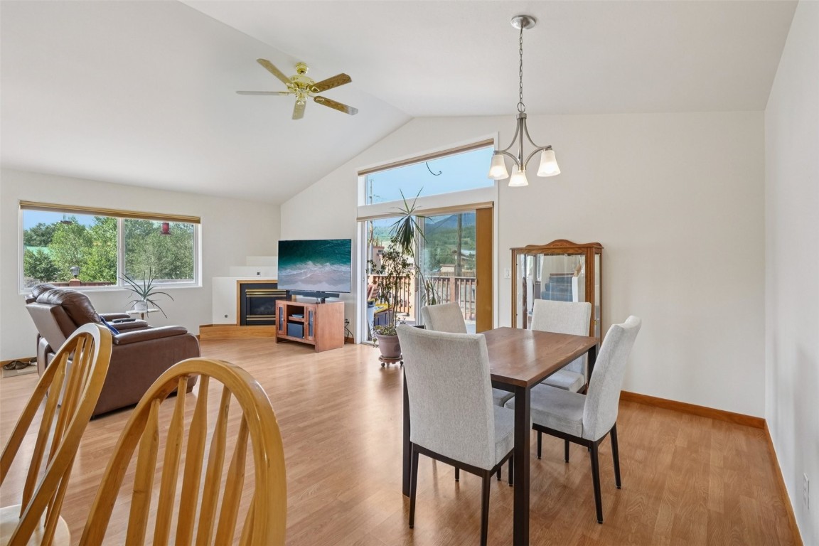 380 Riley Road Silverthorne, CO 80498 - Photo 21 of 49 a view of a dining room with furniture window and wooden floor
