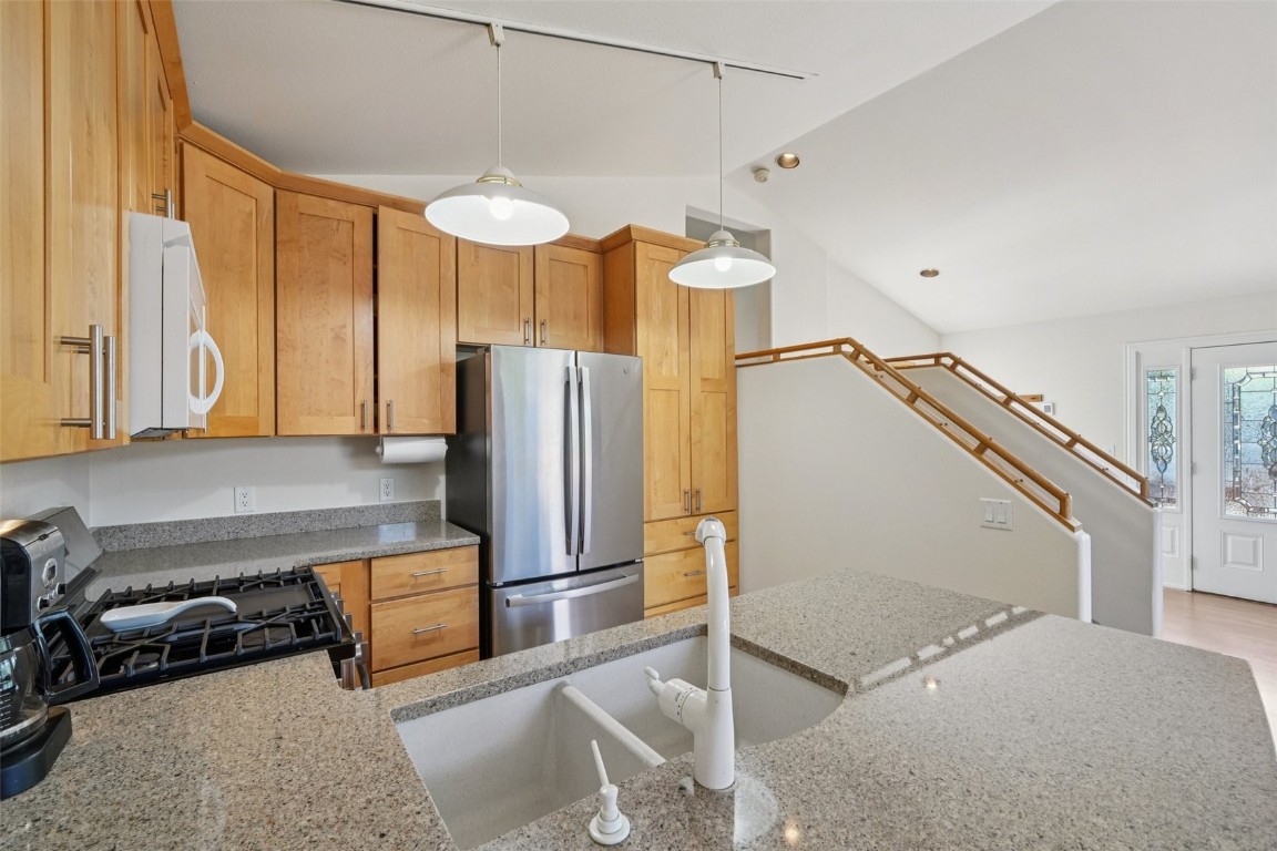 380 Riley Road Silverthorne, CO 80498 - Photo 27 of 49 a kitchen with refrigerator and window