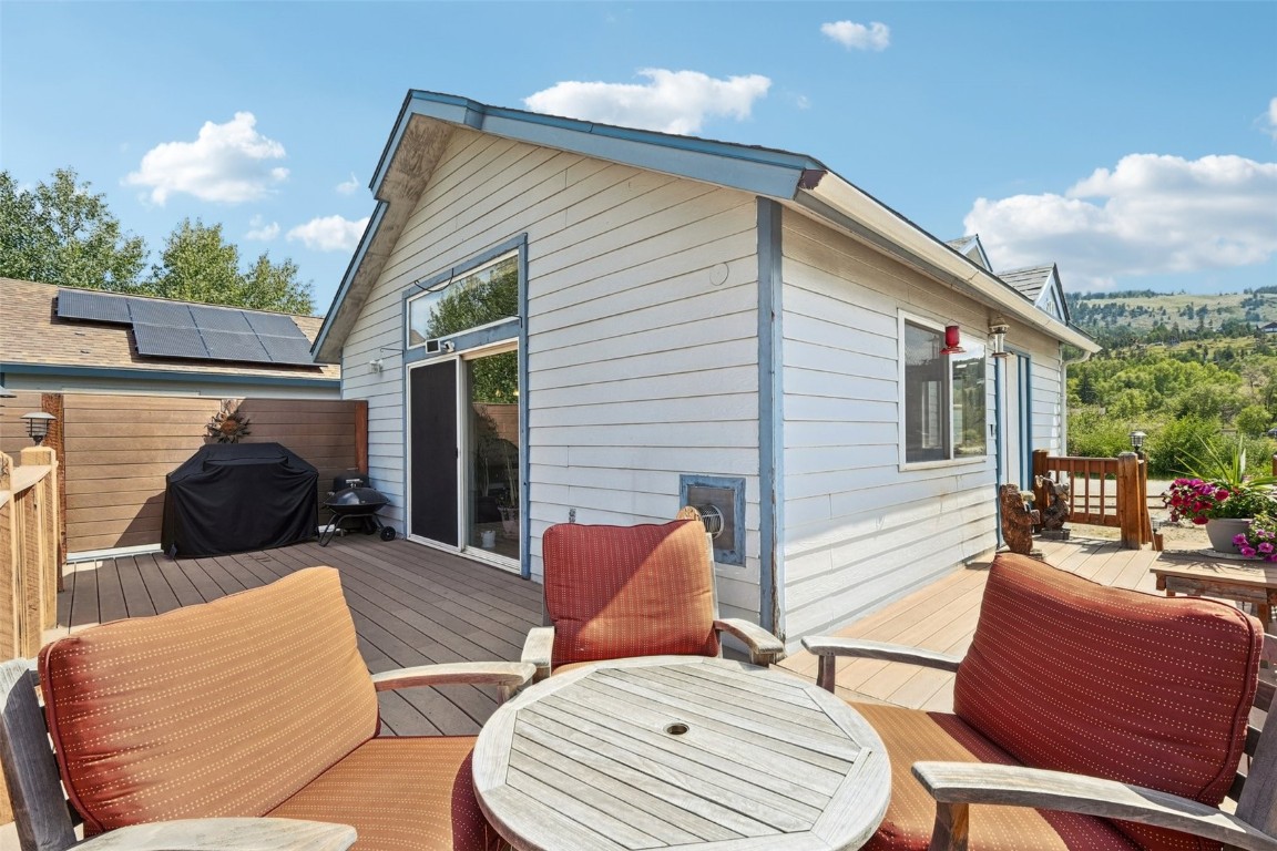 380 Riley Road Silverthorne, CO 80498 - Photo 42 of 49 a view of a patio with a table and chairs