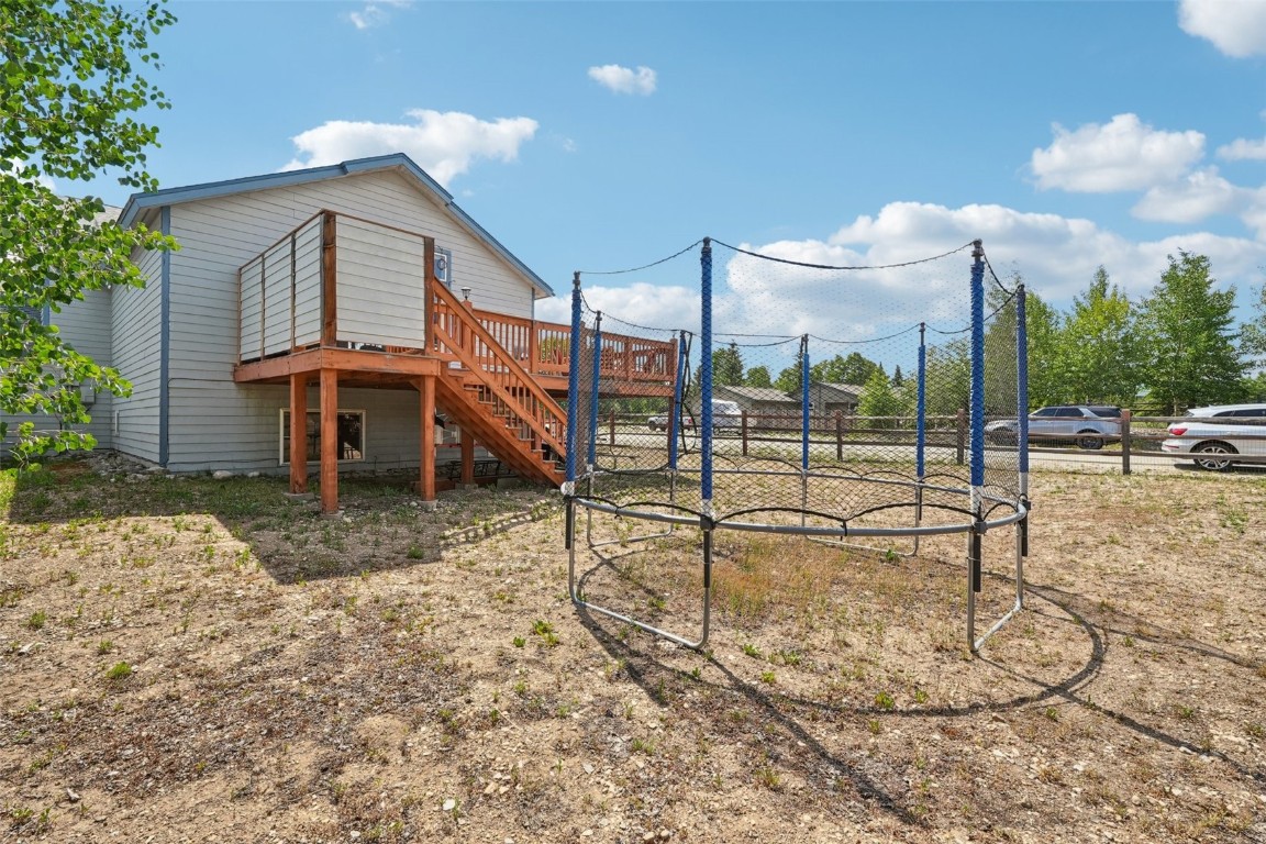 380 Riley Road Silverthorne, CO 80498 - Photo 45 of 49 a view of a house with a yard and sitting area