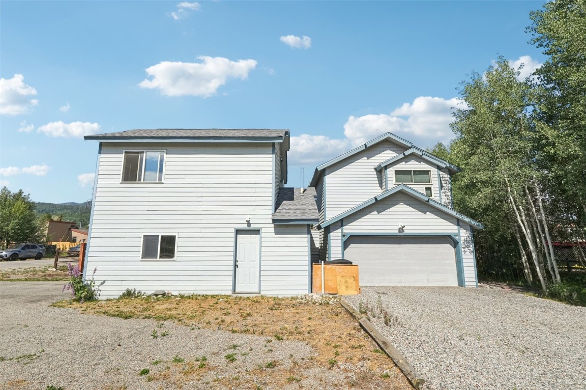 380 Riley Road Silverthorne, CO 80498 - Photo 47 of 49 a front view of a house with a yard