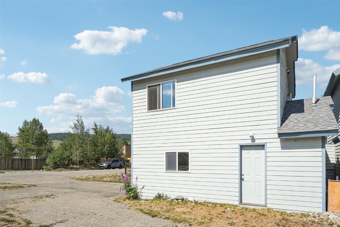 380 Riley Road Silverthorne, CO 80498 - Photo 49 of 49 a view of a house with a backyard