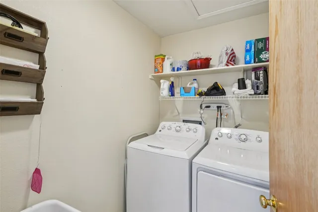 a utility room with dryer and washer