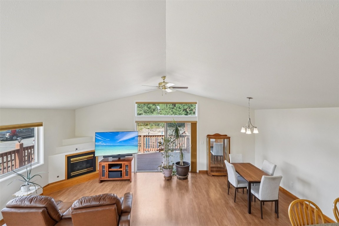 380 Riley Road Silverthorne, CO 80498 - Photo 8 of 49 a living room with furniture and a wooden floor