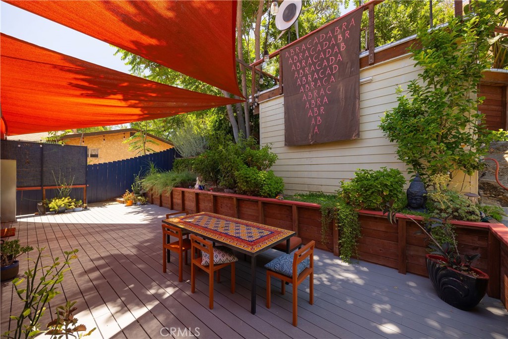 5341 Monterey Road Los Angeles, CA 90042 - Photo 31 of 40 backyard first level access from primary suite, guest bedroom 3 and property side stairs