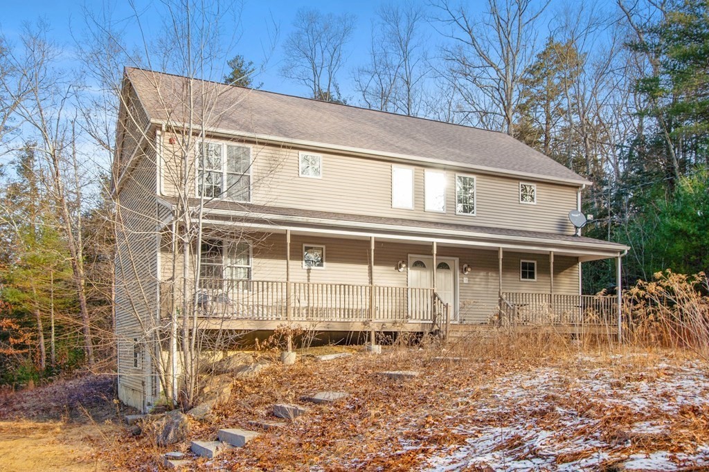 38 Walker Road Wales, MA 01081 - Photo 3 of 42 a front view of a house with a yard