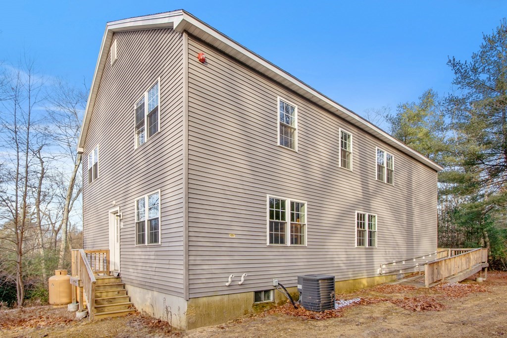 38 Walker Road Wales, MA 01081 - Photo 9 of 42 a front view of a house