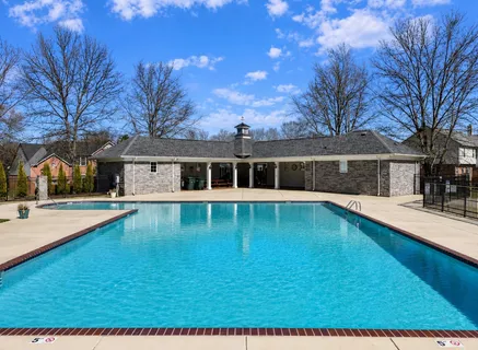 a view of pool with outdoor seating