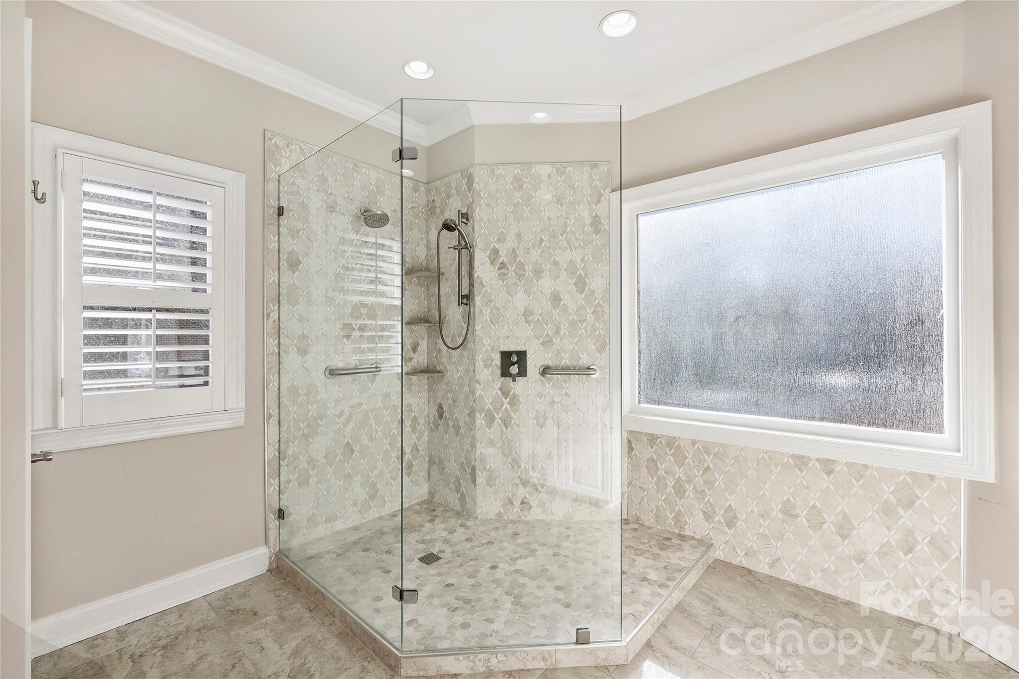 5242 Colony Road Charlotte, NC 28226 - Photo 17 of 34 a bathroom with a shower