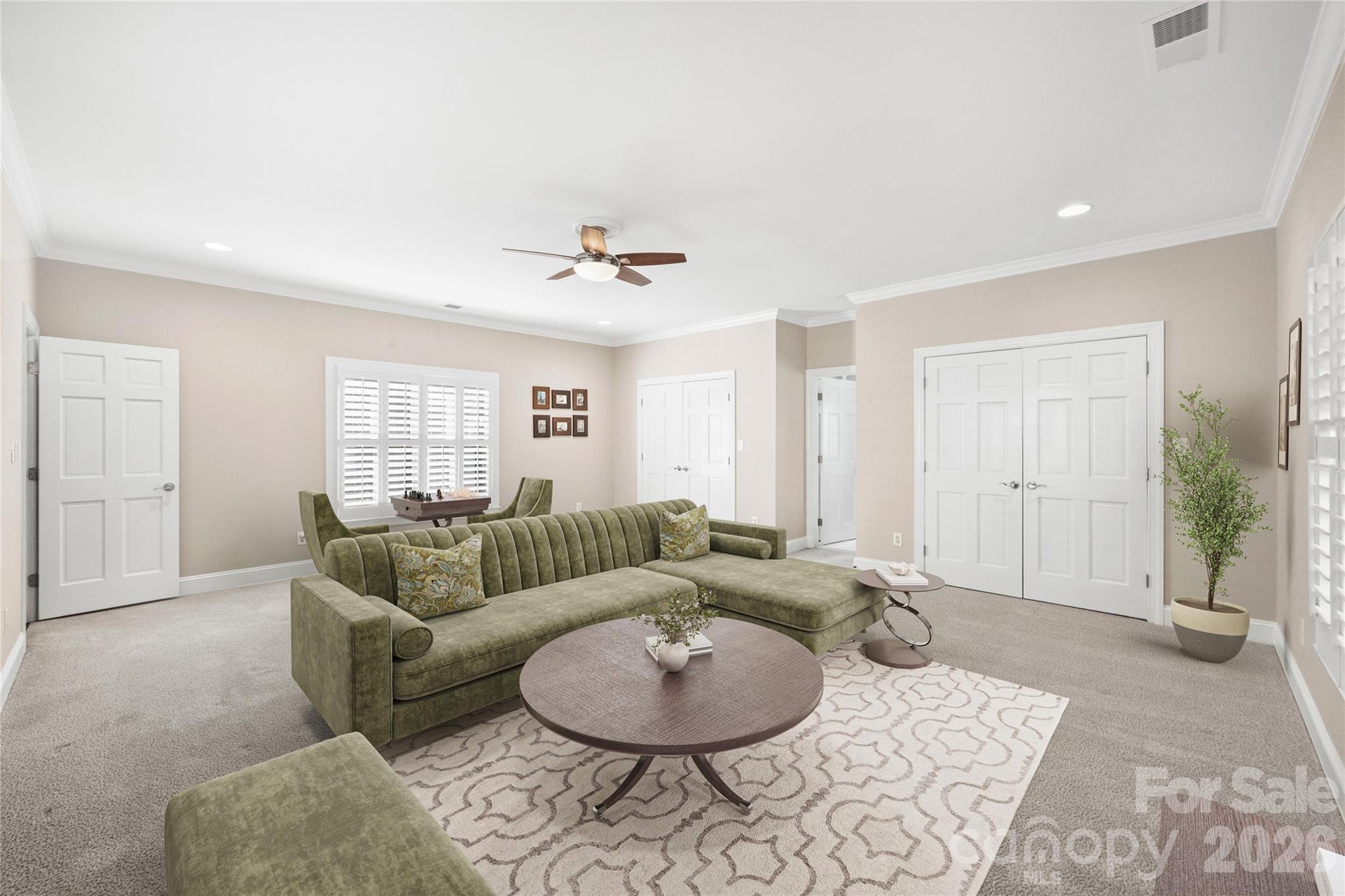 5242 Colony Road Charlotte, NC 28226 - Photo 23 of 34 a living room with furniture and a wooden floor