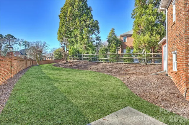 a view of backyard with green space