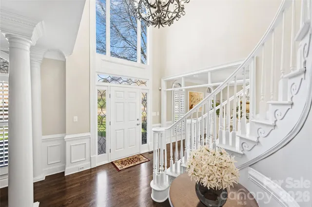 a view of entryway with wooden floor