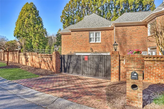 a front view of a house with yard