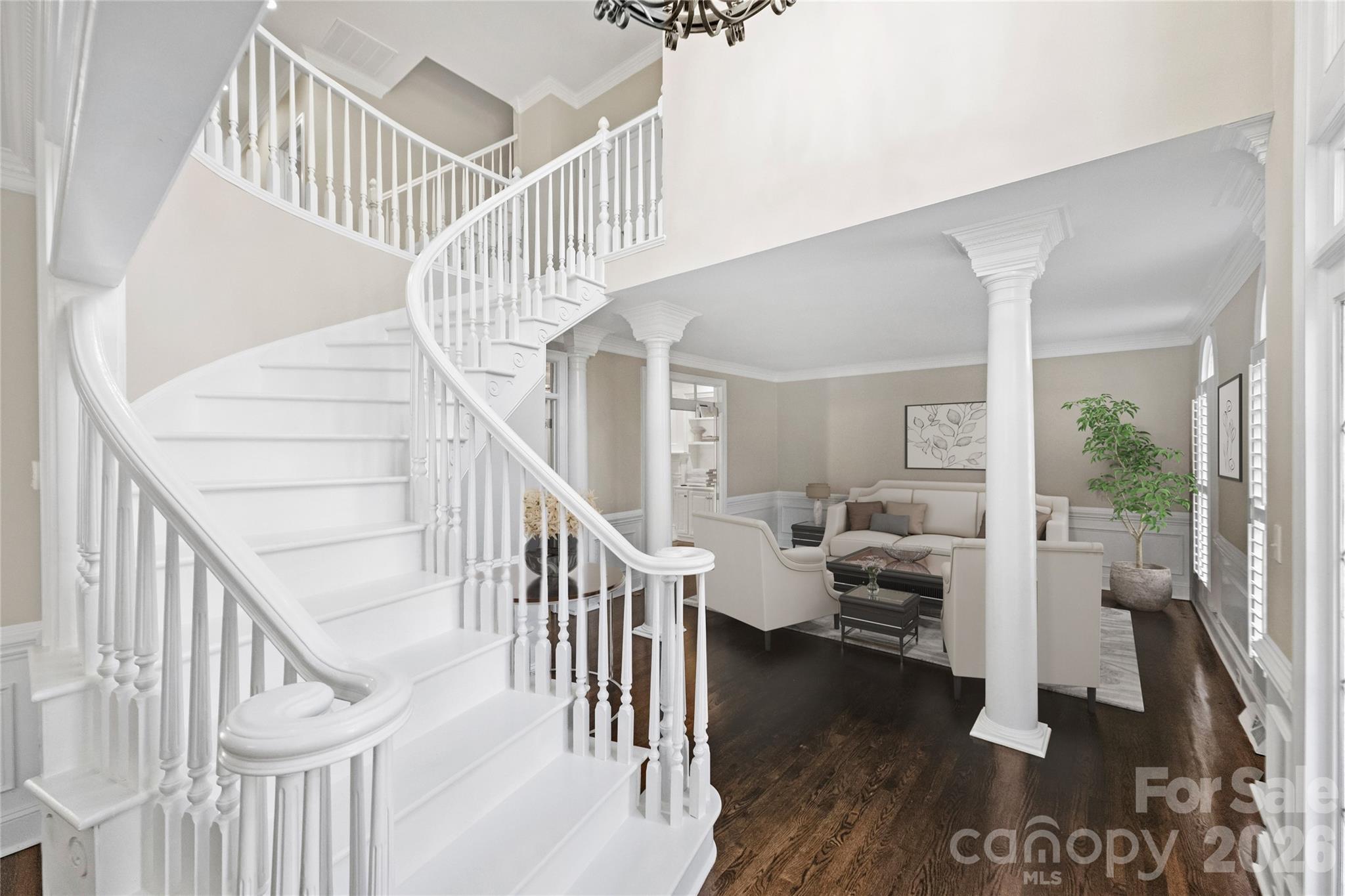 5242 Colony Road Charlotte, NC 28226 - Photo 5 of 34 a view of entryway and hall with wooden floor