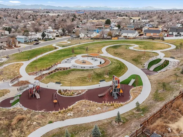 a view of a swimming pool with a garden
