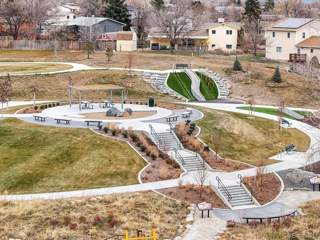 a view of a swimming pool with a lounge chairs