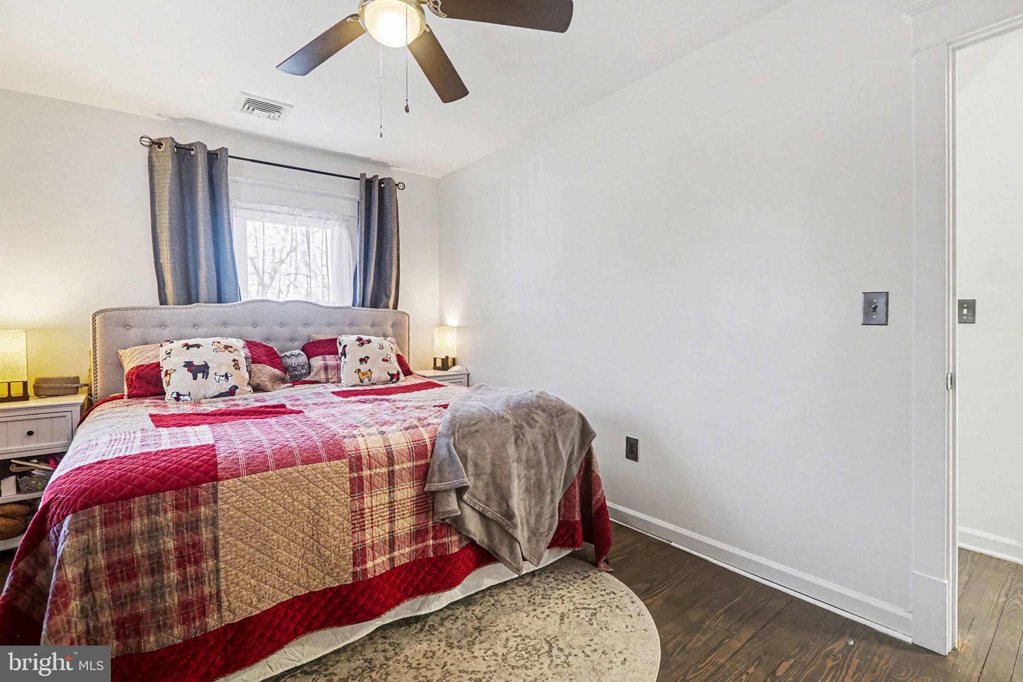206 East Simpson Street Mechanicsburg, PA 17055 - Photo 17 of 30 a bedroom with a bed and a window