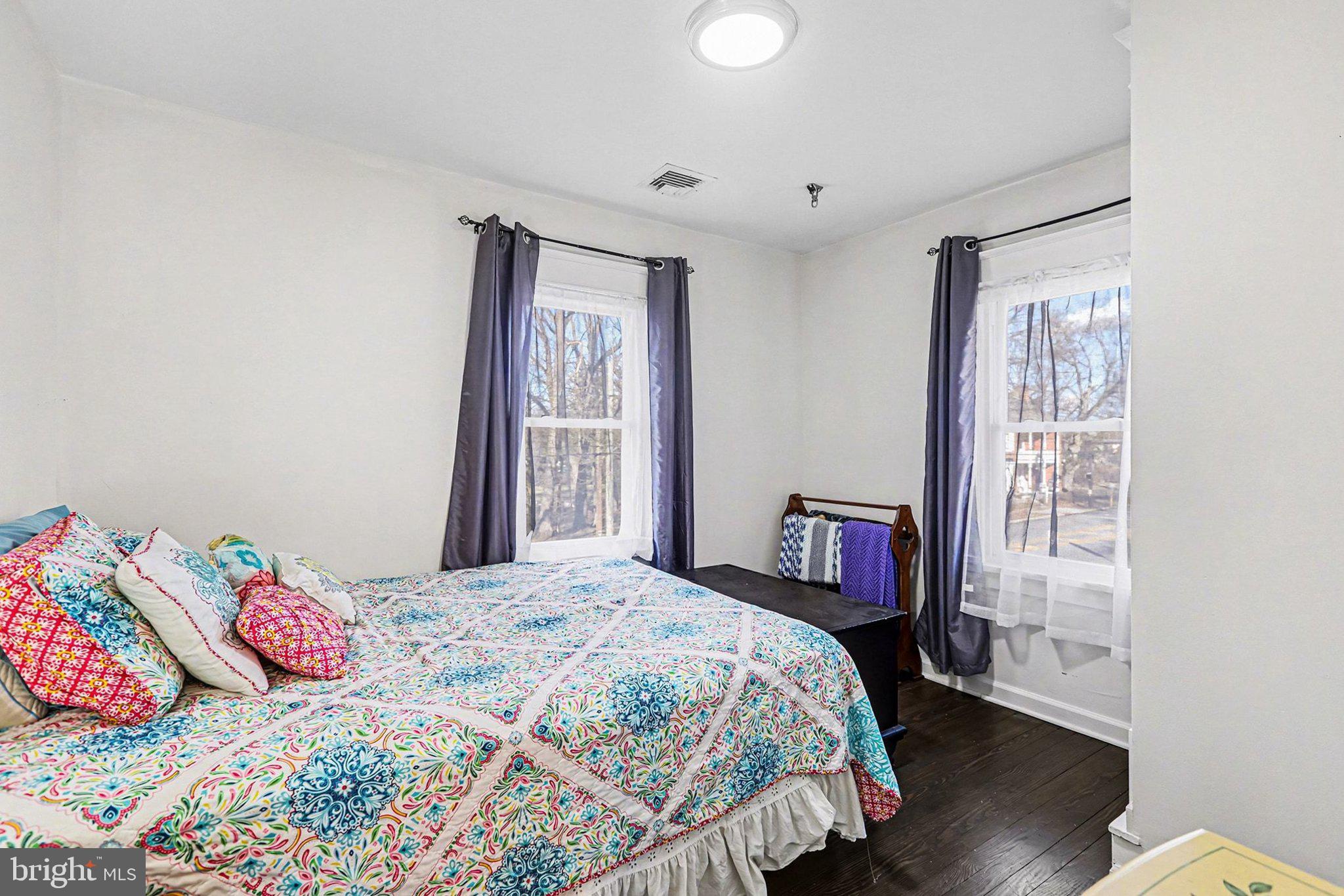 206 East Simpson Street Mechanicsburg, PA 17055 - Photo 21 of 30 a bedroom with a bed and a window