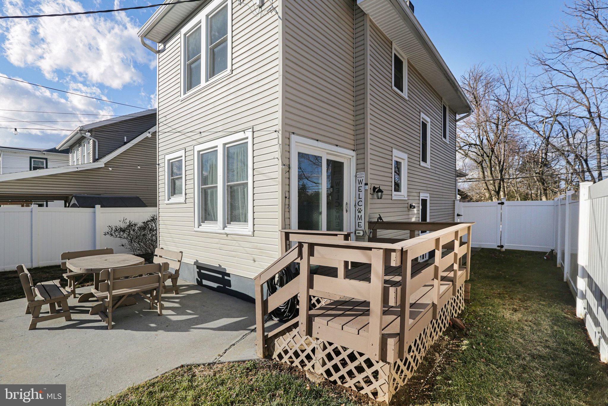 206 East Simpson Street Mechanicsburg, PA 17055 - Photo 28 of 30 a view of a house with backyard and sitting area