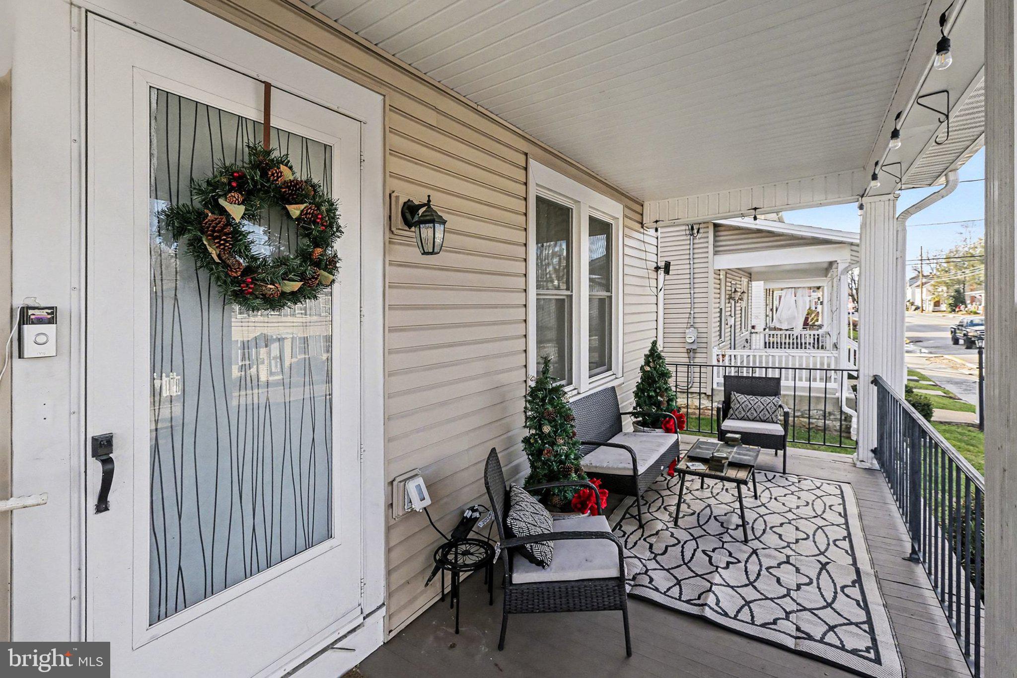 206 East Simpson Street Mechanicsburg, PA 17055 - Photo 6 of 30 a living room with furniture and a potted plant