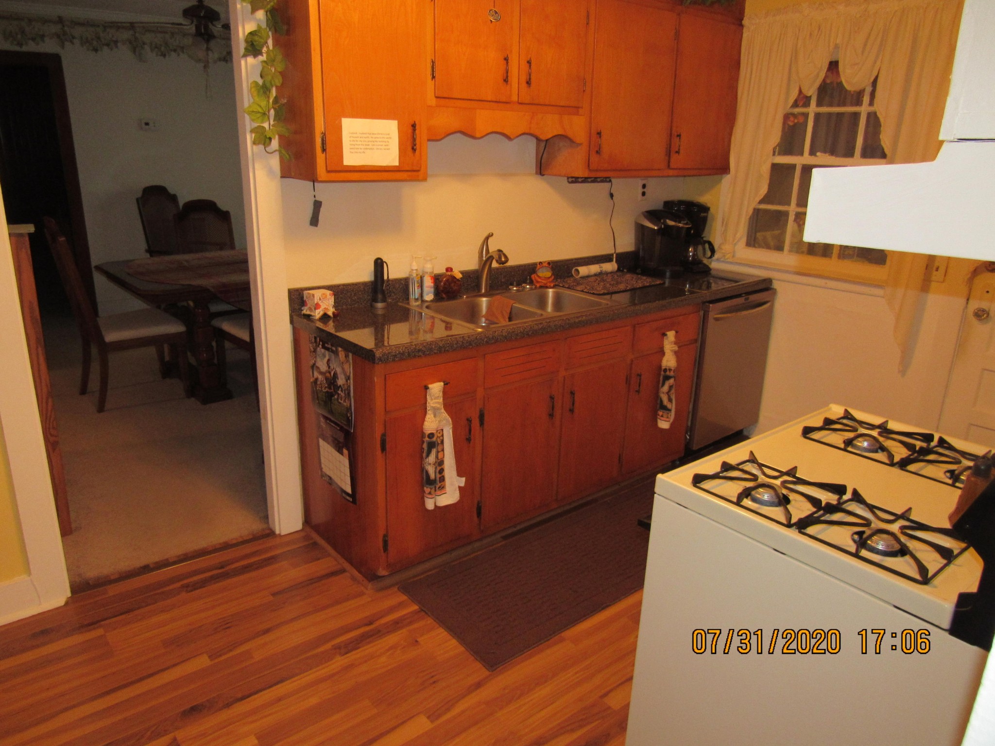 1207 Spring Street Lancing, TN 37770 - Photo 14 of 19 a kitchen with a stove and a refrigerator