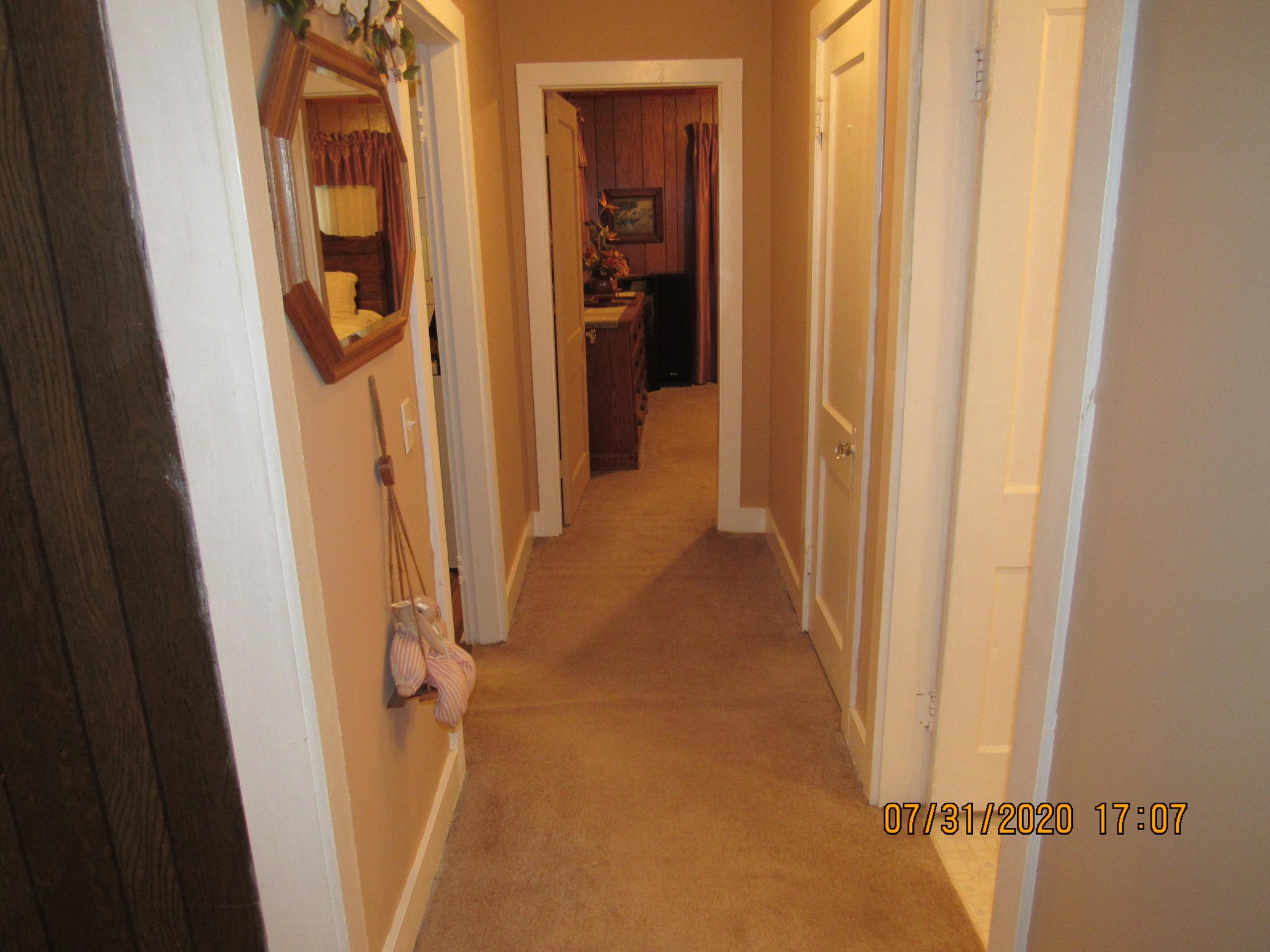 1207 Spring Street Lancing, TN 37770 - Photo 17 of 19 a view of a hallway with wooden floor and entryway