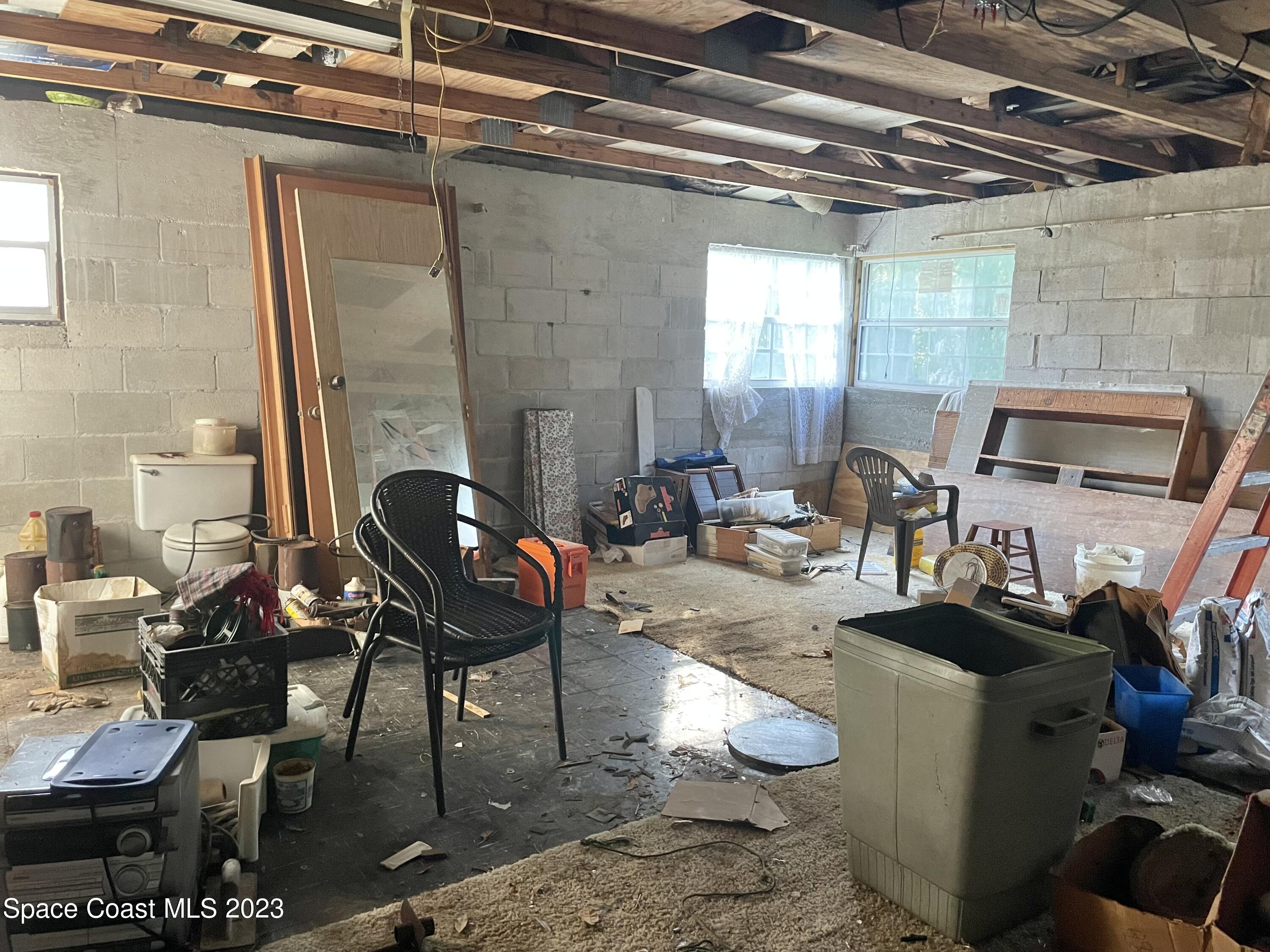 2245 Commodore Boulevard Melbourne, FL 32904 - Photo 14 of 15 a room with musical instruments