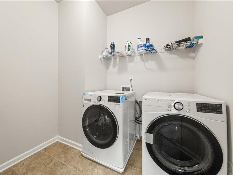 1395 Crestwind Road Northwest Kennesaw, GA 30152 - Photo 19 of 35 a utility room with dryer and washer