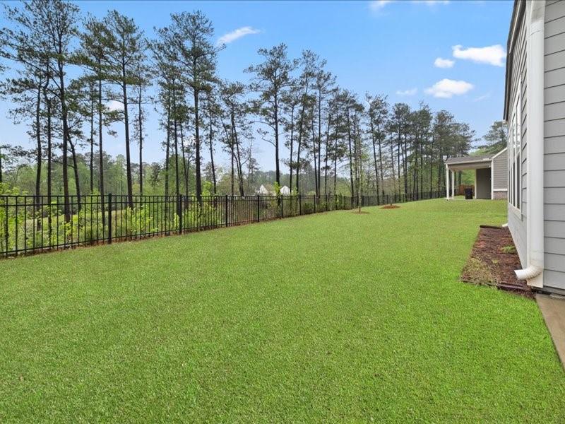 1395 Crestwind Road Northwest Kennesaw, GA 30152 - Photo 28 of 35 a view of a backyard