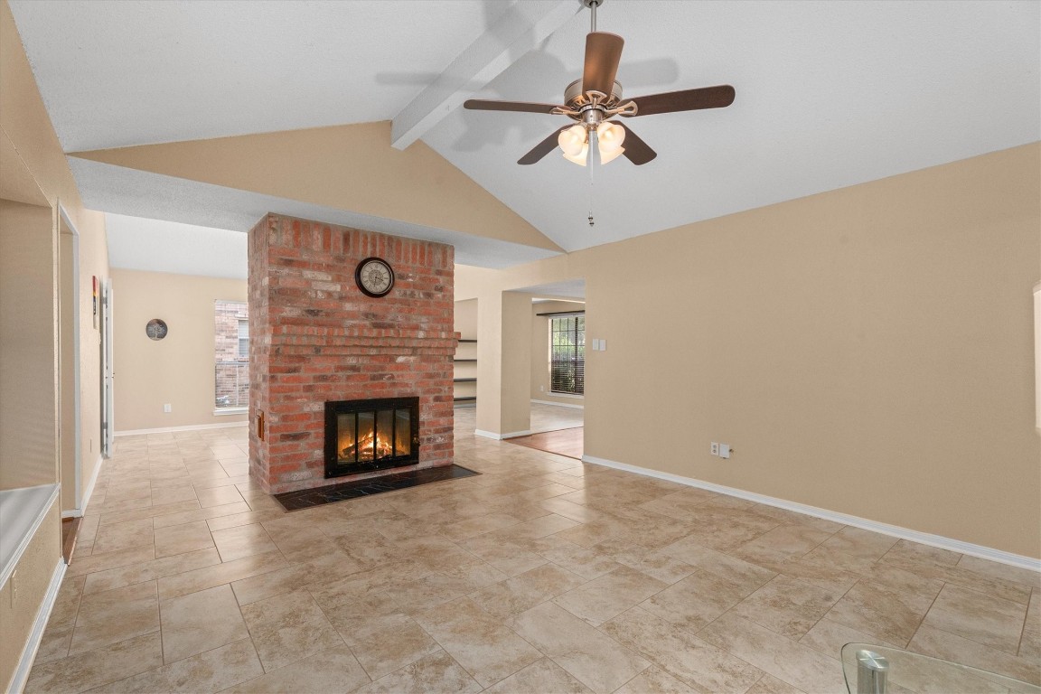 6907 Five Forks Drive Spring, TX 77379 - Photo 15 of 45 Spacious family room with ceiling fan and direct access to dining and kitchen.