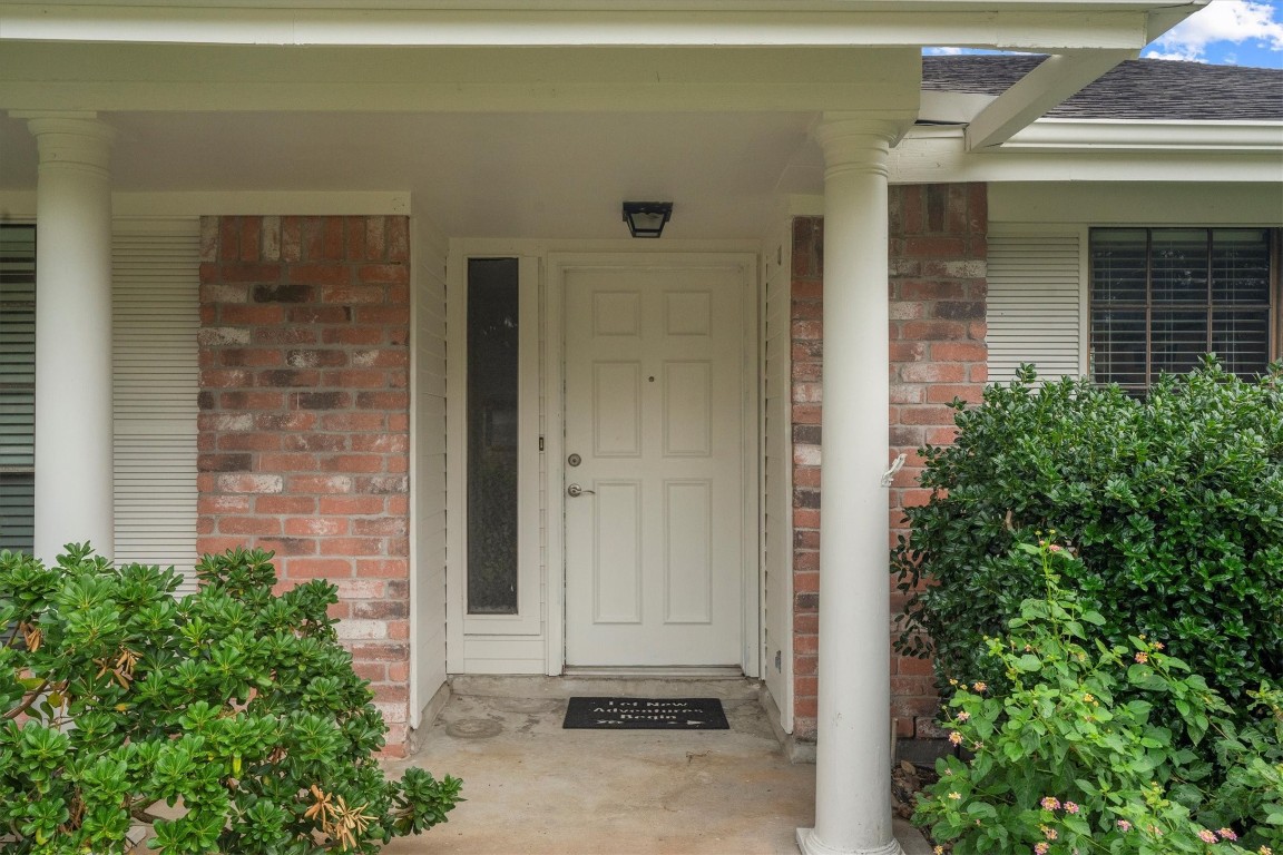 6907 Five Forks Drive Spring, TX 77379 - Photo 5 of 45 Covered front porch with brick accents and welcoming entryway.