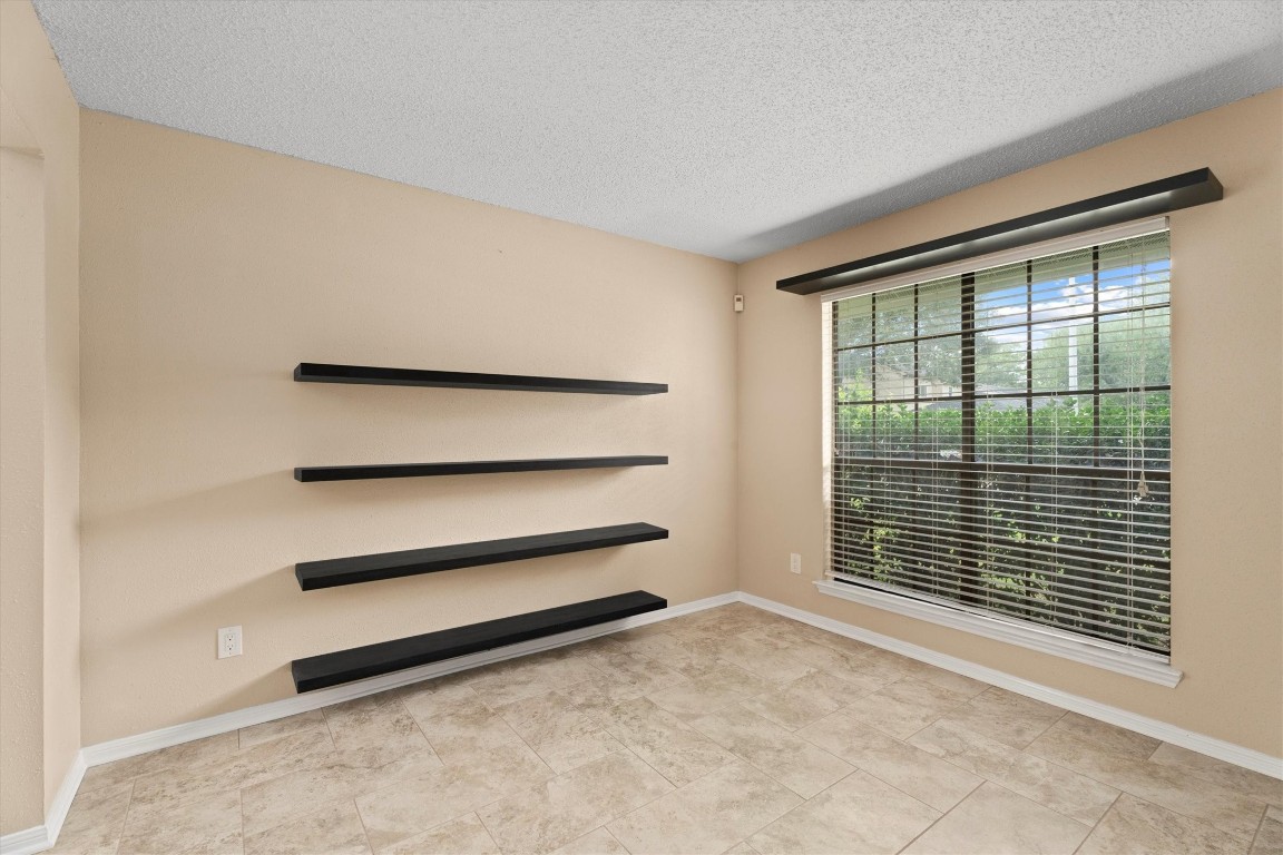 6907 Five Forks Drive Spring, TX 77379 - Photo 10 of 45 Bright formal living with large window overlooking front yard.