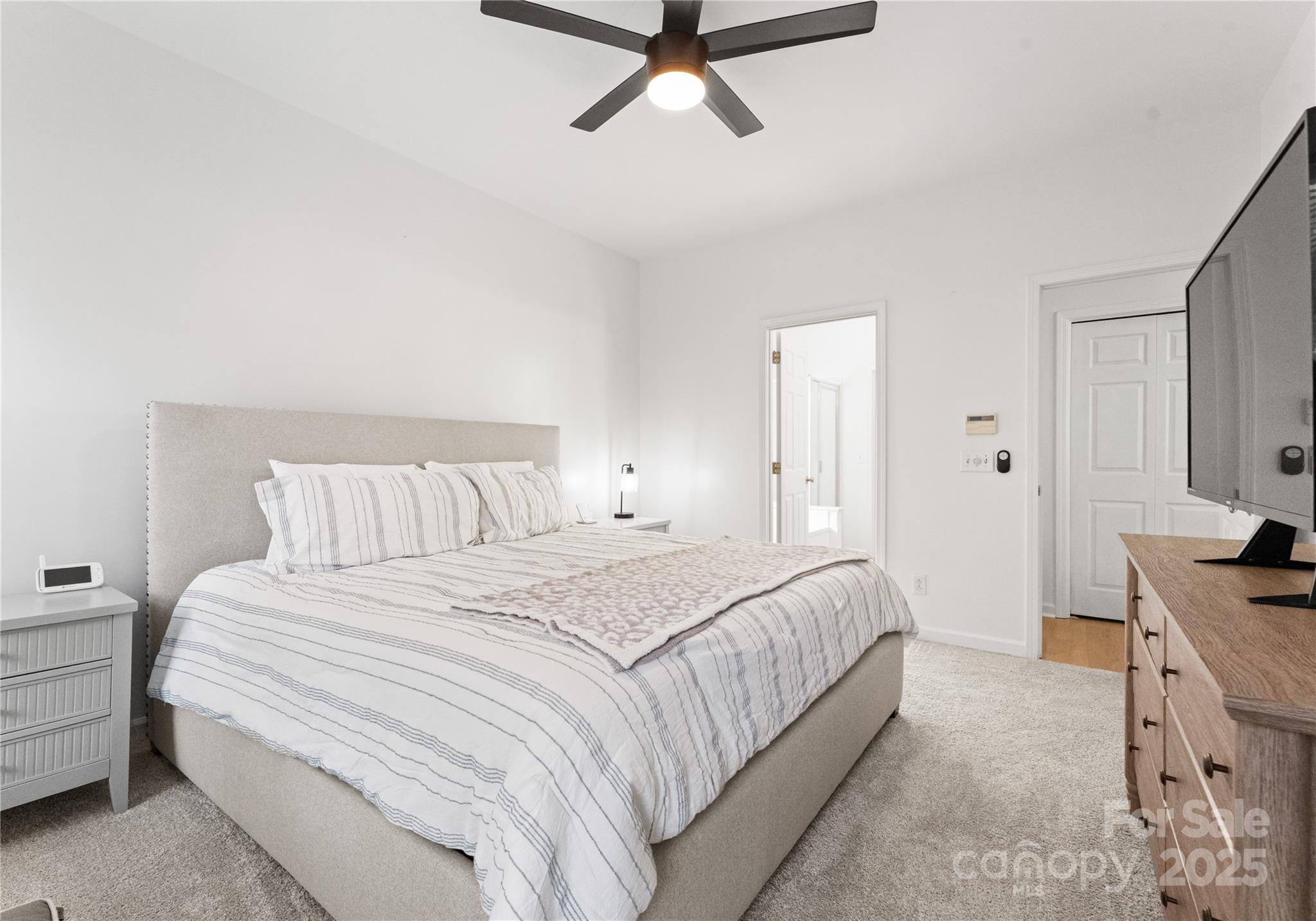 11403 Ridge Oak Drive Charlotte, NC 28273 - Photo 19 of 45 a bedroom with a bed and a cabinets