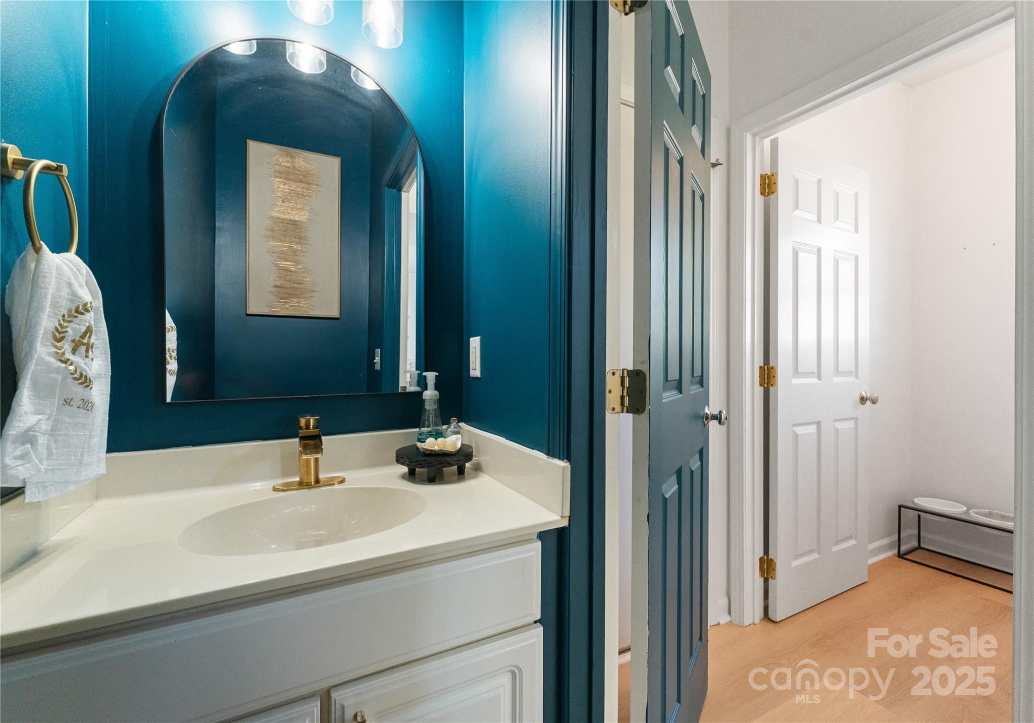 11403 Ridge Oak Drive Charlotte, NC 28273 - Photo 29 of 45 a bathroom with a sink and a mirror