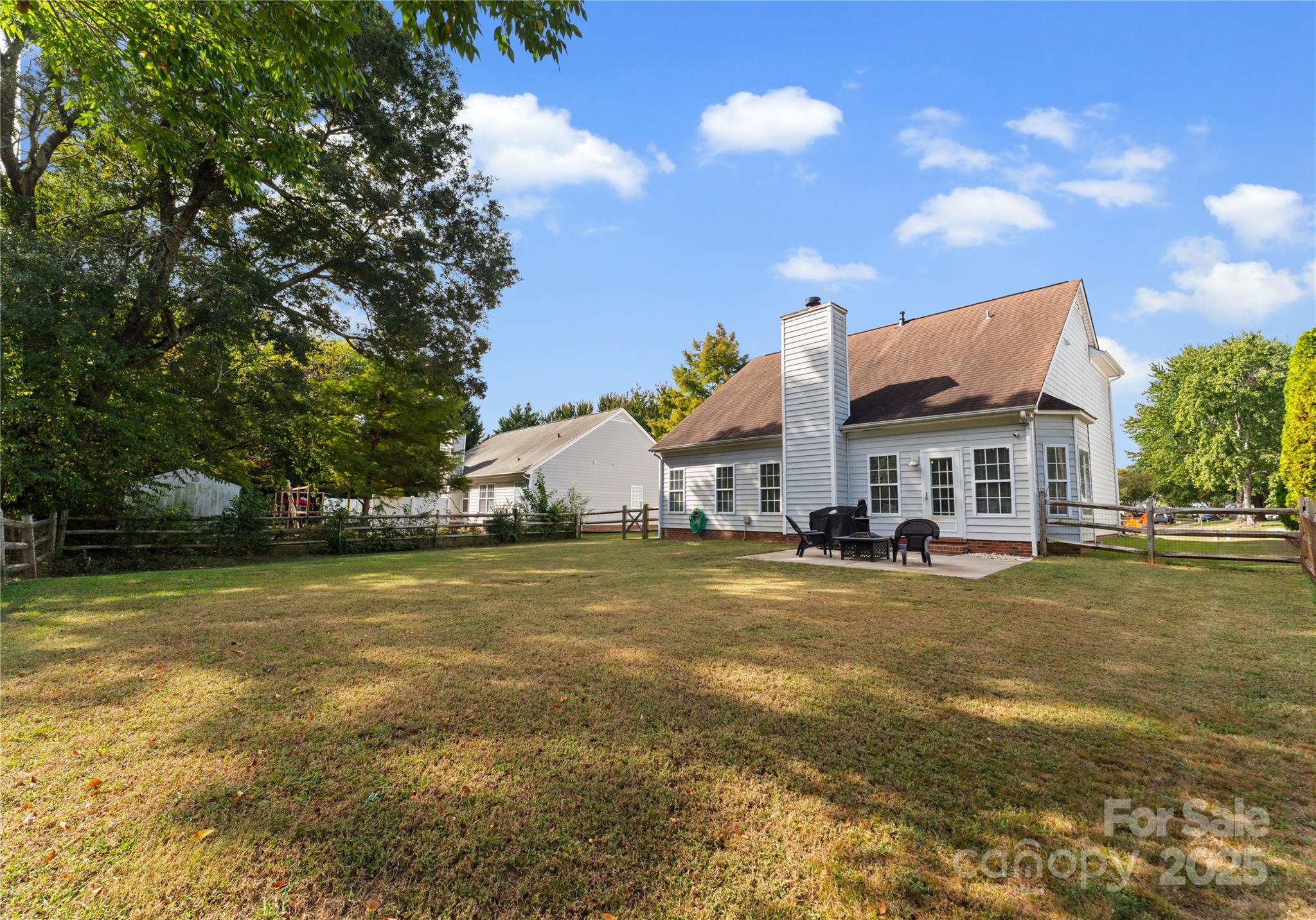 11403 Ridge Oak Drive Charlotte, NC 28273 - Photo 30 of 45 a front view of a house with a big yard