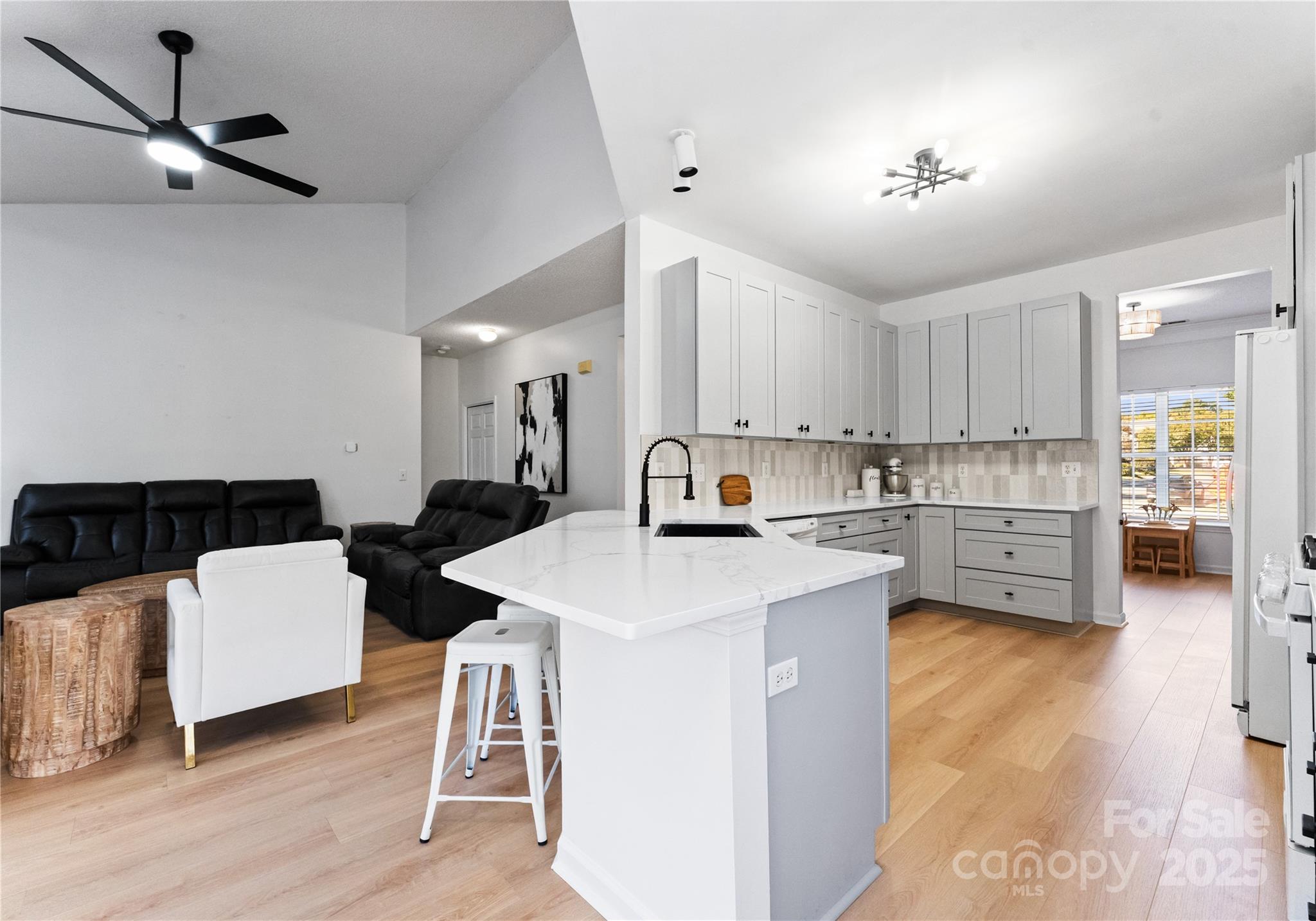 11403 Ridge Oak Drive Charlotte, NC 28273 - Photo 9 of 45 a kitchen with a sink appliances and cabinets