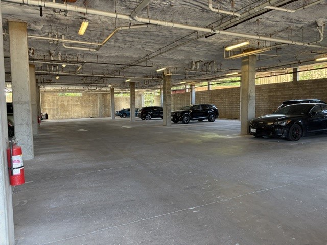 6444 Burnet Road, Unit 201 Austin, TX 78757 - Photo 15 of 18 Secure, covered parking with ample space for residents and guests.