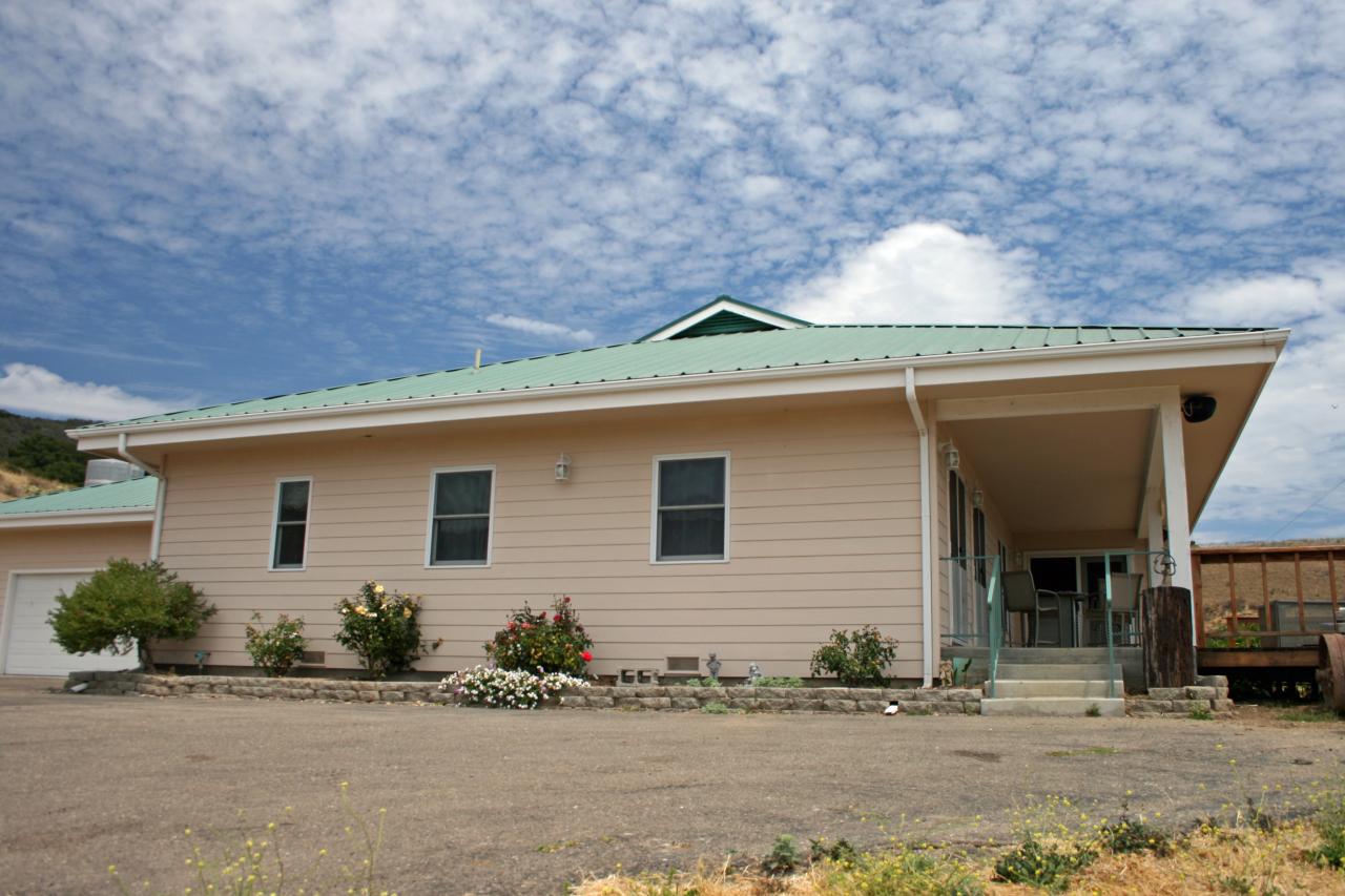 1100 Refugio Road Goleta, CA 93117 - Photo 11 of 28 a front view of a house with a yard