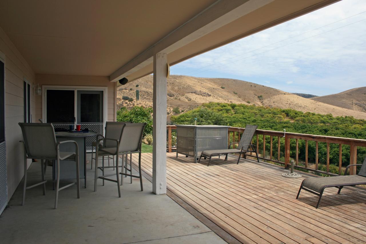 1100 Refugio Road Goleta, CA 93117 - Photo 10 of 28 a view of a balcony with chairs and wooden floor