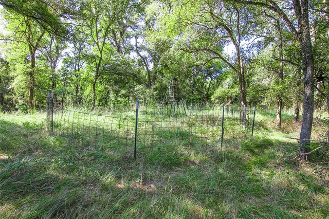 a view of a lake view with a big yard